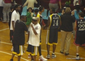Basketball players at a Chinese basketball game