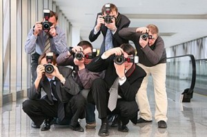 Paparazzi taking pictures