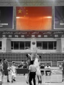 Two teams tip off to play a game of basketball in China