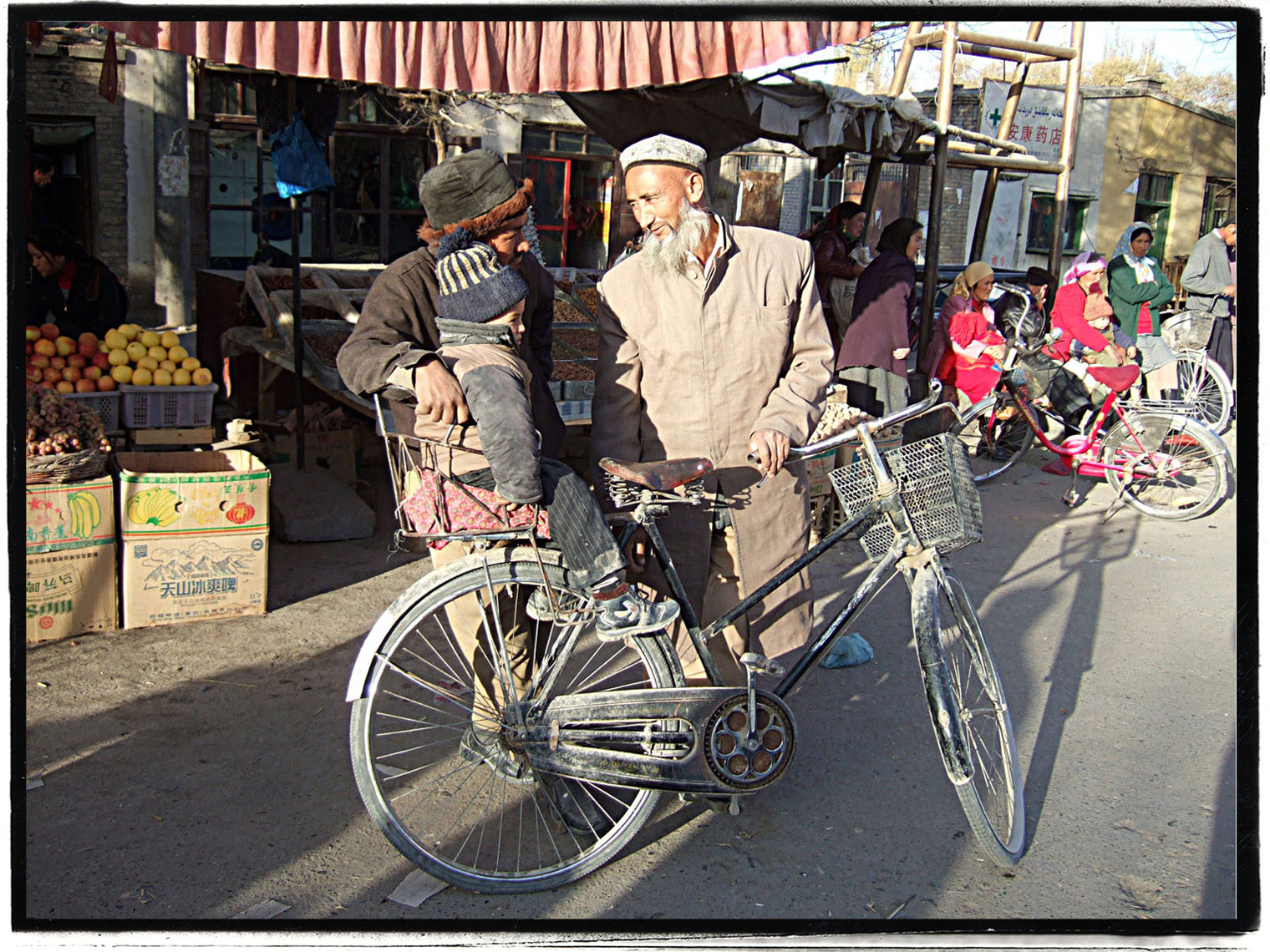Uyghur Bike Uyghurs ride a bike in Xinjiang