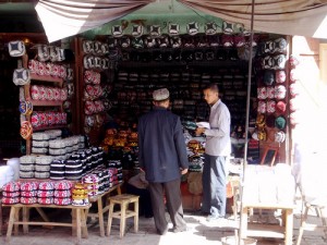 A man selling Uyghur hats in Kashgar