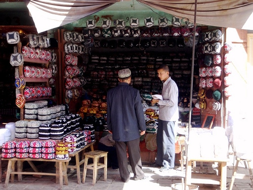 A man selling Uyghur hats in Kashgar