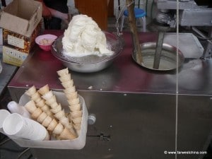 A street vendor's ice cream cart