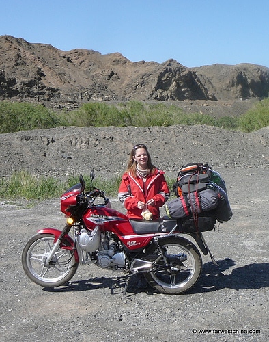 motorcycle trip Motorcycle loaded for a road trip in Xinjiang, China