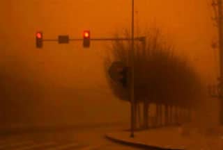 Sandstorm turns a city orange