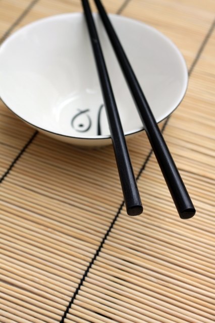 Chinese chopsticks and bowl on a table