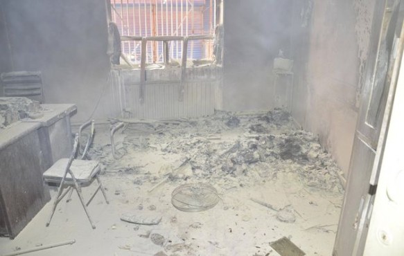 The charred remains of the Hotan police station