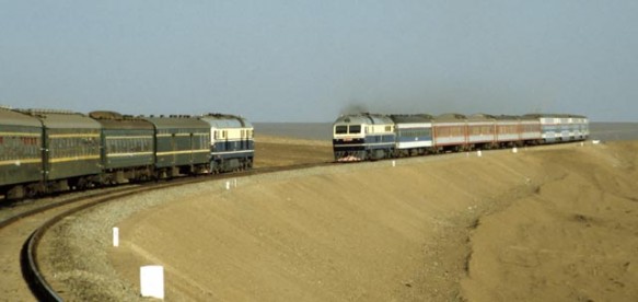 A train traveling along the Xinjiang desert