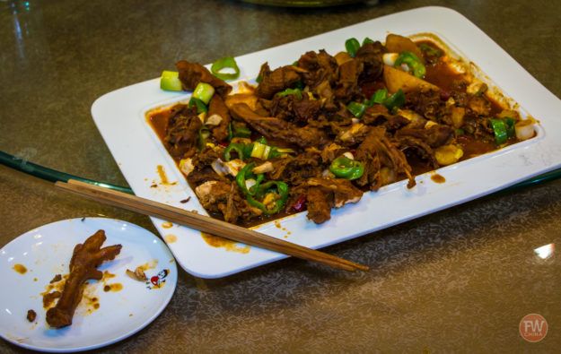 A plate of 大盘鸡 (aka "DaPanJi" or "Big Plate Chicken" from China's Xinjiang region