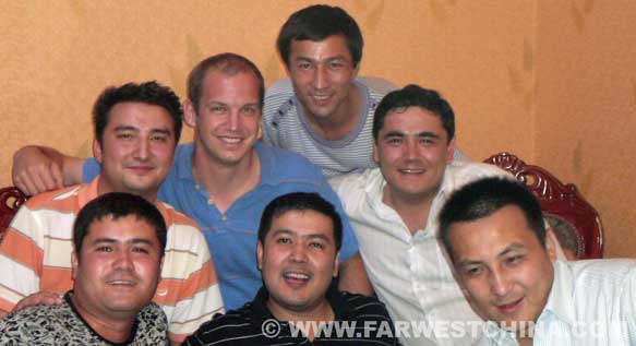 Me posing with my Uyghur friends in the restaurant