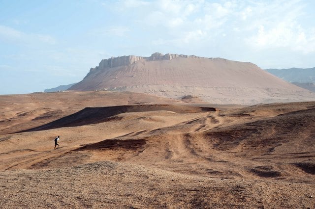 A single competitor races through the Gobi Desert