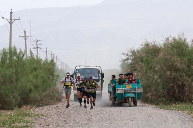 Race leaders run Stage 5 of the Gobi March 2010