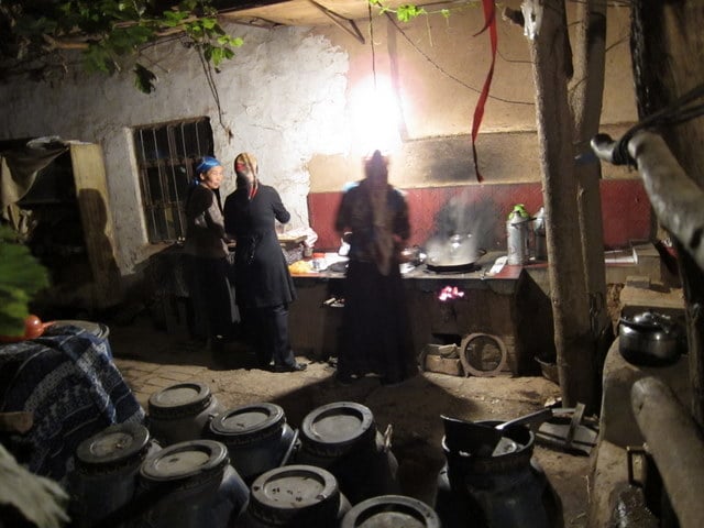 A Uyghur homestay makes dinner in Xinjiang, China