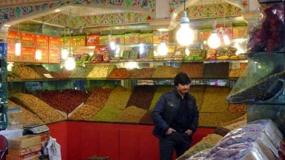 A fruit and nut seller in Urumqi, Xinjiang