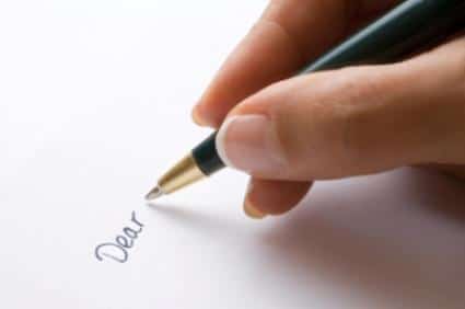Writing a letter to Xinhua