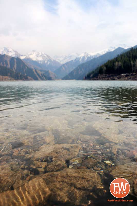 A closeup view of the crystal-clear water at Xinjiang's Heavenly Lake