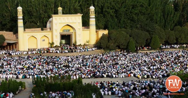 Thousands of Uyghur pray at the Id Kah Mosque in Xinjiang, China