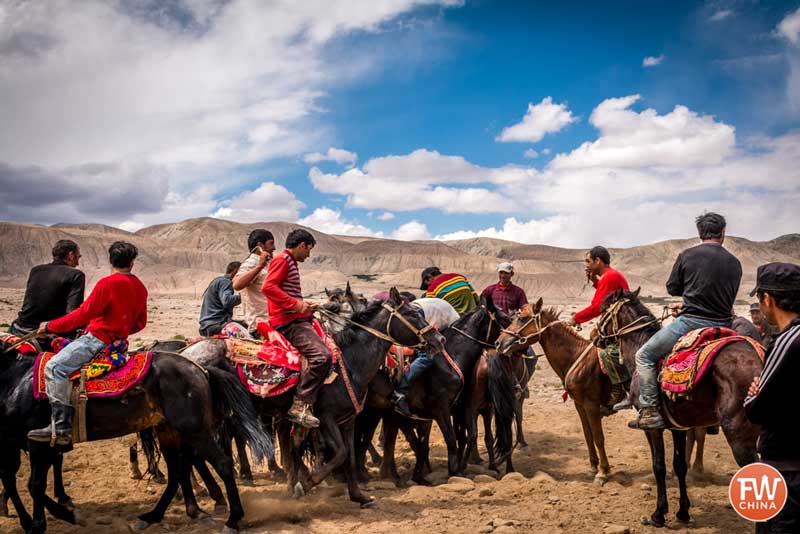 Buzkashi being played on a rocky plain in China's western region of Xinjiang