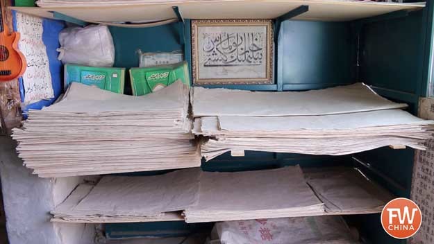 Stacks of Uyghur mulberry bark paper in Khotan, Xinjiang