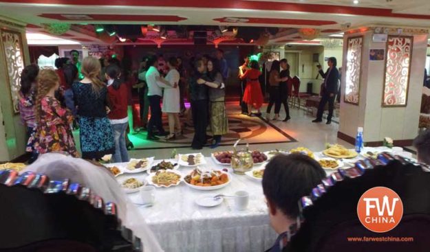 Uyghur Dancing at a wedding in Urumqi, Xinjiang China