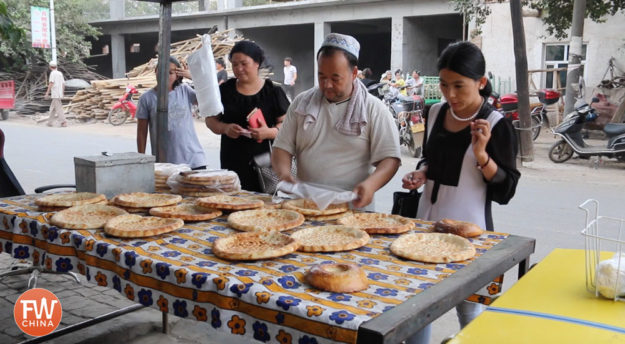 A Uyghur bread stand in Turpan, Xinjiang