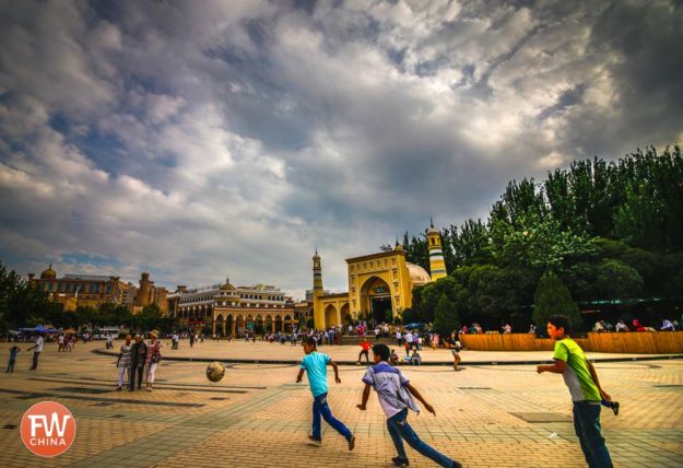 Kids play at Kashgar's Id Kah Mosque