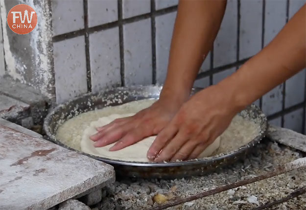 Seasoning the bread dough mixture before baking
