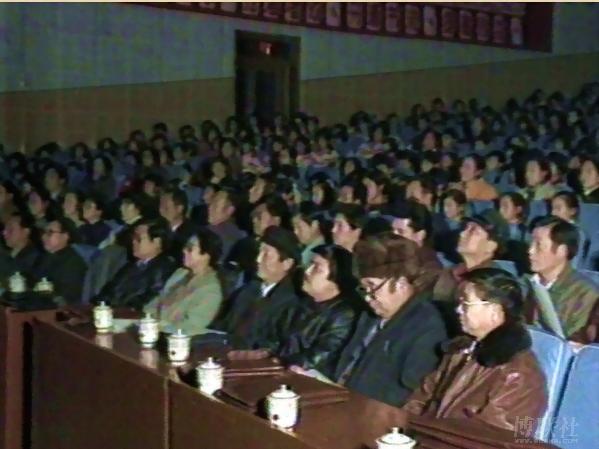 Officials seated in the front rows of the Karamay theater in 1994