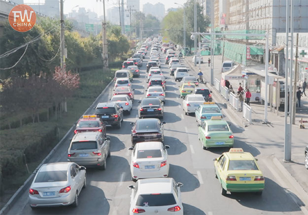 Driving in China on the roads full of traffic